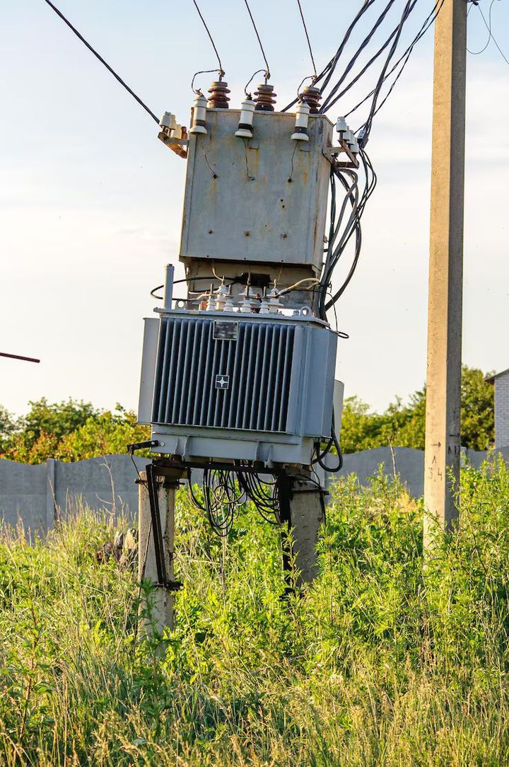 Power Transformers: An Overview of Electrical Basics, Working Principles, and Grid Applications